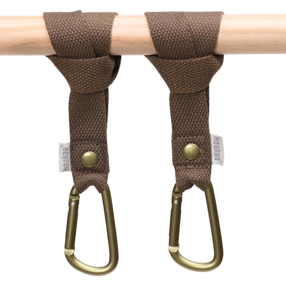 image:imagehaakaa Baby Stroller Hooks for BagsUniversal Stroller Clips and Hooks NonSlip with OneHand Opening Multipurpose Stroller Straps for Diaper Bags Backpacks Bikes amp Shopping Carts Black 2 PackBrown